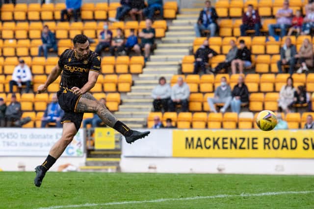 Tony Watt fires in a volley to tie things up for Motherwell in Sunday's 1-1 draw with St Johnstone. Picture: SNS