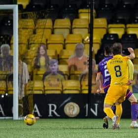 Livingston's Scott Pittman (R) makes it 1-0 during the Scottish Premiership match between Livingston and Dundee United, which finished 2-0 to the home side (Photo by Ross Parker / SNS Group)
