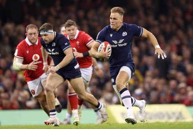 Duhan van der Merwe breaks clear for Scotland during the win over Wales.