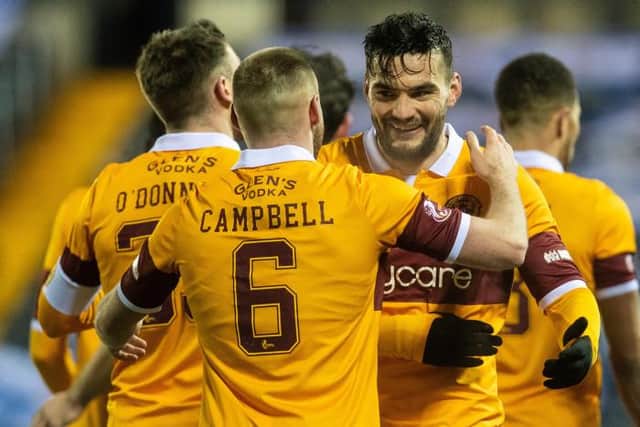 Stephen O'Donnell and Tony Watt celebrates with goalscorer Allan Campbell at Rugby Park on February 10 (Photo by Craig Foy / SNS Group)