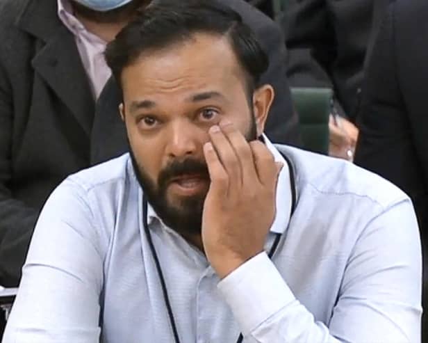 A video grab from footage broadcast by the UK Parliament's Parliamentary Recording Unit (PRU) shows former Yorkshire cricketer Azeem Rafiq fighting back tears while testifying in front of a Digital, Culture, Media and Sport (DCMS) Committee in London on November 16, 2021 as MPs probe racial harassment at the club.