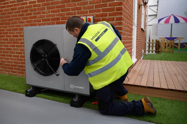 Heat pumps, like this one on a model house in Slough, are set to become an increasingly common sight (Picture: Leon Neal/Getty Images)