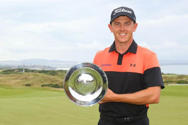 Grant Forrest shows off the Hero Open trophy after his win at Fairmont St Andrews. Picture: Andrew Redington/Getty Images.
