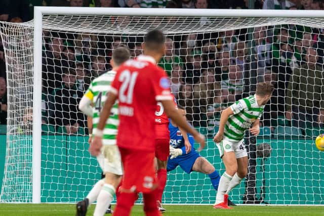James Forrest turns the ball past Hobie Verhulst in the AZ goal to make it 2-0 to Celtic.