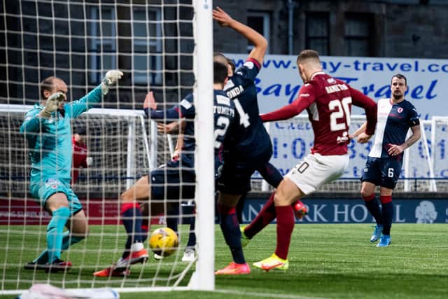 Jack Hamilton converts from close range to level for Arbroath against Raith Rovers.