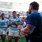 Scotland players applaud Argentina off the field after losing the series-deciding test match at the Madre de Ciudades Stadium last weekend. (Photo by PABLO GASPARINI/AFP via Getty Images)
