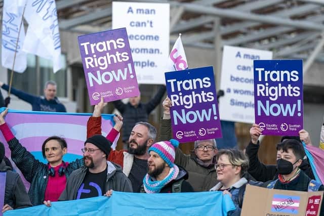 Members of the Scottish Family Party protest alongside supporters of the Gender Recognition Reform Bill (Scotland) outside the Scottish Parliament, Edinburgh, ahead of a debate on the bill. Picture: PA