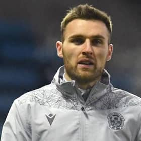 Motherwell's Stephen O'Donnell warming up during a Scottish Premiership match between Kilmarnock and Motherwell at Rugby Park on February 10, 2021, in Kilmarnock, Scotland (Photo by Craig Foy / SNS Group)
