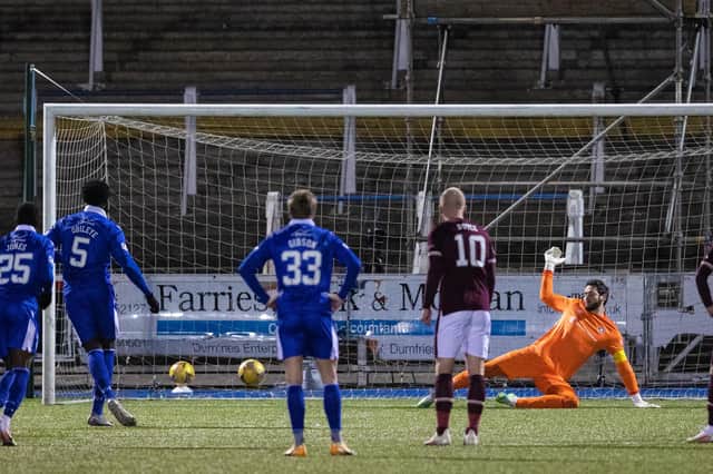 Ayo Obileye opens the scoring from the penalty spot at Palmerston Park.