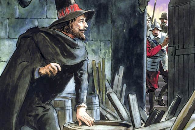 Guy Fawkes is caught in the act of preparing the Gunpowder Plot in the cellar of the Houses of Parliament in this illustration from Peeps into the Past, published in the 1900s (Picture: Historica Graphica Collection/Heritage Images/Getty Images)