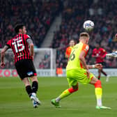 Bournemouth's Ryan Christie (right) and Nottingham Forest's Sam Surridge battle for the ball during the Sky Bet Championship match at the Vitality Stadium, Bournemouth.