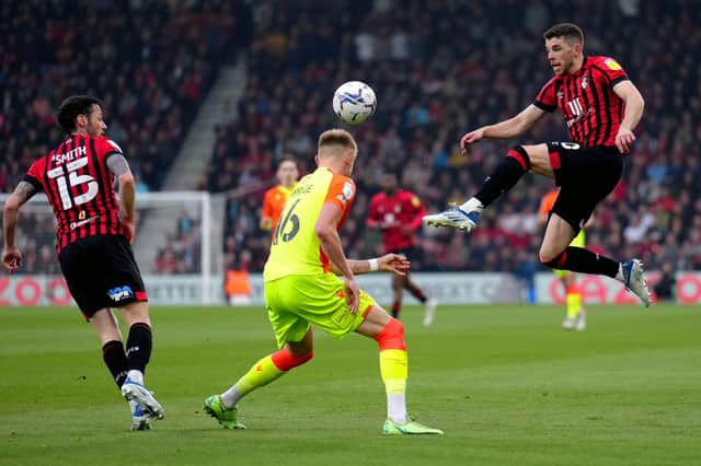 Bournemouth's Ryan Christie (right) and Nottingham Forest's Sam Surridge battle for the ball during the Sky Bet Championship match at the Vitality Stadium, Bournemouth.