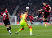 Bournemouth's Ryan Christie (right) and Nottingham Forest's Sam Surridge battle for the ball during the Sky Bet Championship match at the Vitality Stadium, Bournemouth.