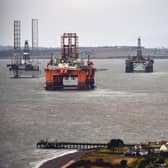 Oil rigs in the Cromarty Firth in 2016 after price falls saw workers lose their jobs as production slowed (Picture: Jeff J Mitchell/Getty Images)