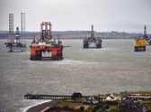 Oil rigs in the Cromarty Firth in 2016 after price falls saw workers lose their jobs as production slowed (Picture: Jeff J Mitchell/Getty Images)