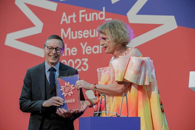 Duncan Dornan, head of museums and collections for Glasgow Life, accepting the Art Fund Museum of the Year 2023 award for the Burrell Collection from Grayson Perry at the British Museum. Picture: Hydar Dewachi/Art Fund