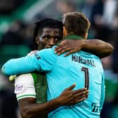 Hibs goalkeeper David Marshall embraces team-mate Rocky Bushiri after the goalless draw against Celtic.  (Photo by Craig Williamson / SNS Group)