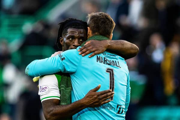 Hibs goalkeeper David Marshall embraces team-mate Rocky Bushiri after the goalless draw against Celtic.  (Photo by Craig Williamson / SNS Group)