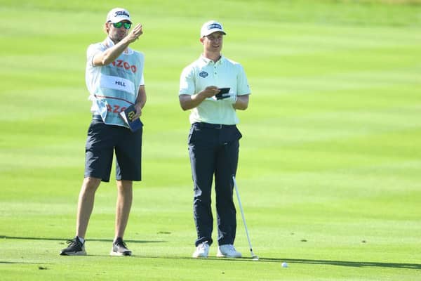 Calum Hill chats to his caddie during the third round of the Cazoo Classic at the London Golf Club in West Kingsdown. Picture: Andrew Redington/Getty Images.