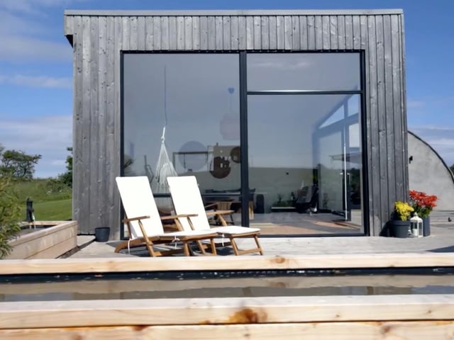 The Old Waterworks has a sun room which opens on to a social space.