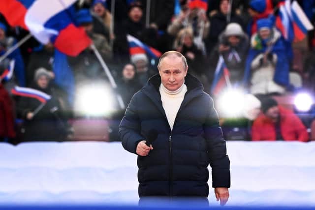 Vladimir Putin attends a concert last weekend marking the eighth anniversary of Russia's annexation of Crimea. Picture: Sergei Guneyev/AFP/Getty