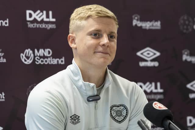Alex Cochrane says Hearts are keeping spirits high despite having to deal with a tough schedule and injuries.