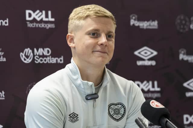 Alex Cochrane says Hearts are keeping spirits high despite having to deal with a tough schedule and injuries.