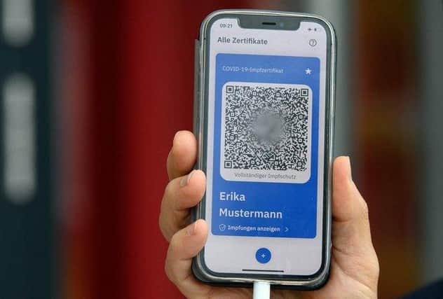 Covid vaccine passports are being introduced in paper and digital forms for certain large events