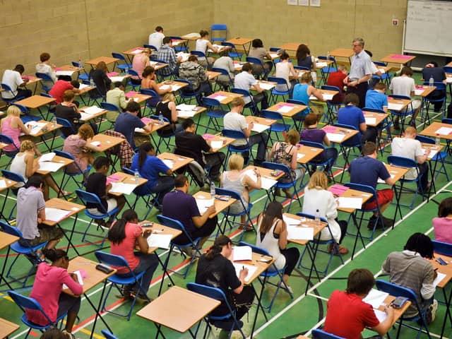 Pupils sitting an exam. Ben Birchall/PA Wire