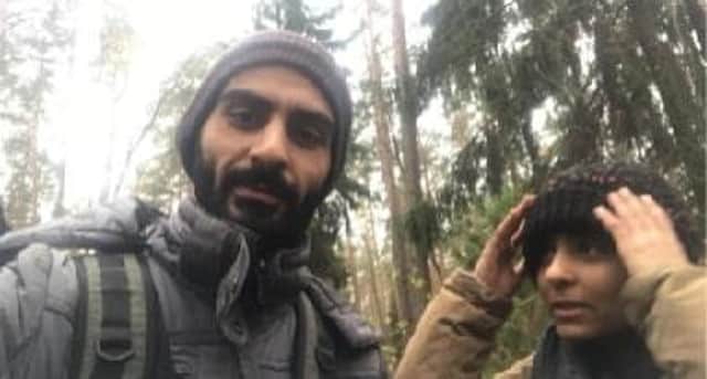 Israa, right, her uncle Hjeij, left, and her father Ammar, unpictured, are trapped in the vast forests on the border of Belarus, Poland and Lithuania