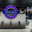 Volunteers acting as passengers pass one of the Merson Group's station roundels during an Elizabeth line train test run in March. Picture: Niklas Halle'n/AFP/Getty Images