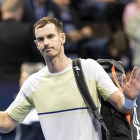 Andy Murray of Great Britain looks dejected after losing to Roberto Bautista Agut in straight sets.