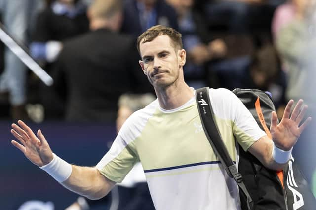 Andy Murray of Great Britain looks dejected after losing to Roberto Bautista Agut in straight sets.