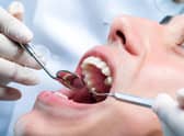 Dentists are having to make “difficult decisions” about whether to continue with NHS work. Pic: Alamy/PA.
