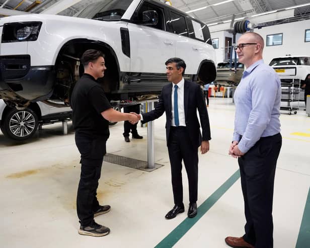 Rishi Sunak visits a Land Rover plant in Warwick in July for an announcement about a new electric car battery factory (Picture: Christopher Furlong/Getty Images)