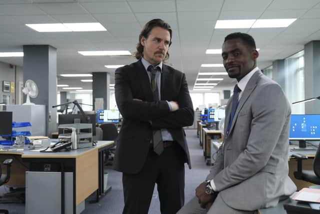 Jamie Sives and Reginal Kudiwu play detectives Dougie Gillman and Louis Leblance in Crime.