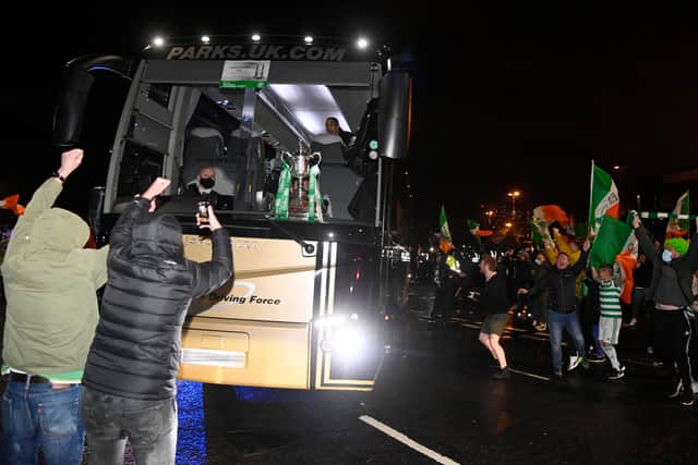 Celtic fans greet the team bus after the William Hill Scottish Cup Final between Celtic and Hearts at Hampden Park, on December 20, 2020, in Glasgow, Scotland. (Photo by Rob Casey/SNS Group via Getty Images)