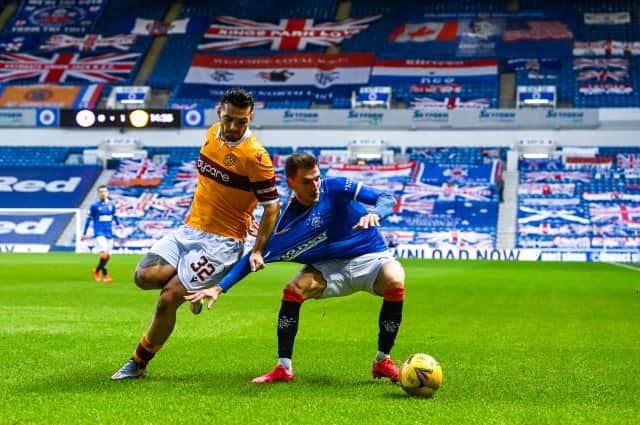 Rangers defender Borna Barisic tussles with Motherwell striker Tony Watt during the Ibrox side's 3-1 win on Saturday. (Photo by Rob Casey / SNS Group)