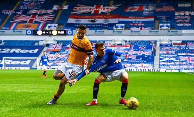 Rangers defender Borna Barisic tussles with Motherwell striker Tony Watt during the Ibrox side's 3-1 win on Saturday. (Photo by Rob Casey / SNS Group)