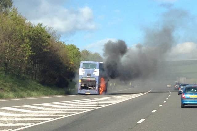 This bus fire on the A1 near Tranent in May 2015 was caused by a fuel fault according to firefighters. Picture:Emma Borthwick