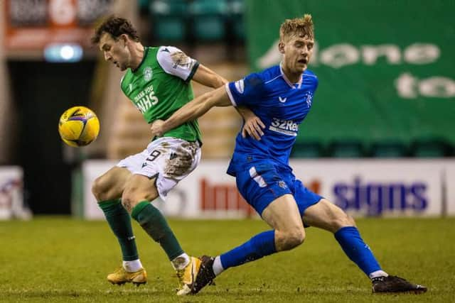 Hibernian's Christian Doidge (left) battles with Rangers' Filip Helander during a Scottish Premiership match between Hibernian and Rangers at Easter Road, on January 27, 2021, in Edinburgh, Scotland