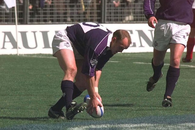 Gregor Townsend dots down for Scotland's third try in the 1999 win over France in Paris. It was a highly significant for the Scotland stand-off as he became only the fifth player to score a try in all four Five Nations championship matches in the same season, and the first Scot to do so since Johnny Wallace in 1925. It was the last Five Nations, with Italy joining the following season to make six.