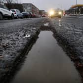 Deep potholes on the A8 Alexandra Parade in Glasgow in January. (Photo by John Devlin/The Scotsman)