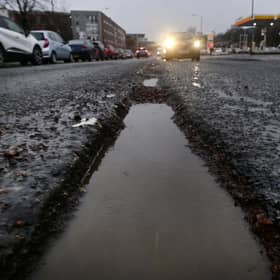 Deep potholes on the A8 Alexandra Parade in Glasgow in January. (Photo by John Devlin/The Scotsman)