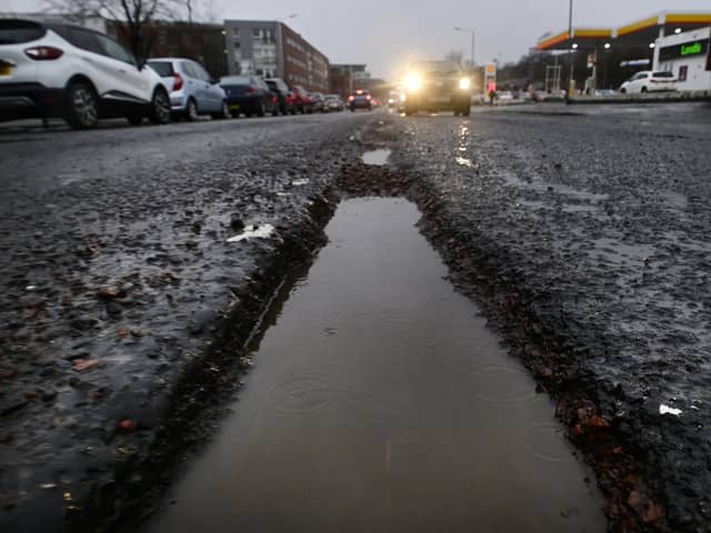 Deep potholes on the A8 Alexandra Parade in Glasgow in January. (Photo by John Devlin/The Scotsman)