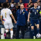 Scotland manager Steve Clarke looks on as his captain Andy Robertson dictates play during the 2-0 win over Armenia at Hampden. (Photo by Ross MacDonald / SNS Group)