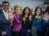 First Minister Nicola Sturgeon with SNP's Zen Ghani, Roza Salih (second right) and Susan Aitken (right) at the Glasgow City Council count at the Emirates Arena in Glasgow, in the local government elections.