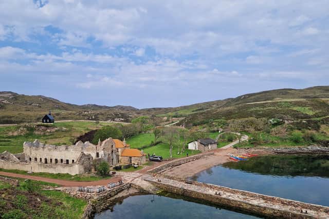 The herring station, now in a state of curated decay, overlooked by the chapel which was brought to the island bought by financier Ian Wace and which is now in the hands of a charitable trust. PIC: A Campsie
