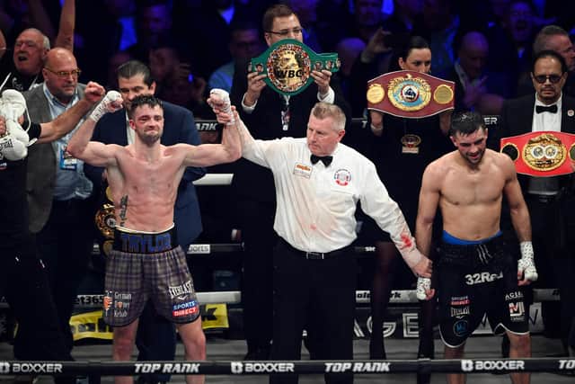 Josh Taylor (left) is declared the victor over Jack Catterall following the world super-lightweight title fight at the OVO Hydro on February 26.  (Photo by Paul Devlin / SNS Group)