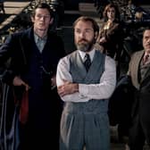 Jessica Williams, Callum Turner, Jude Law , Catherine Waterson, Dan Fogler and Eddie Redmayne in Fantastic Beasts: The Secrets of Dumbledore